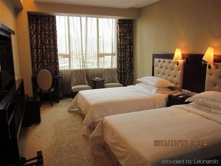 Vienna Hotel In Pinghu Square Shenzhen Oda fotoğraf